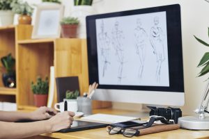 Graphic designer drawing fashion illustration