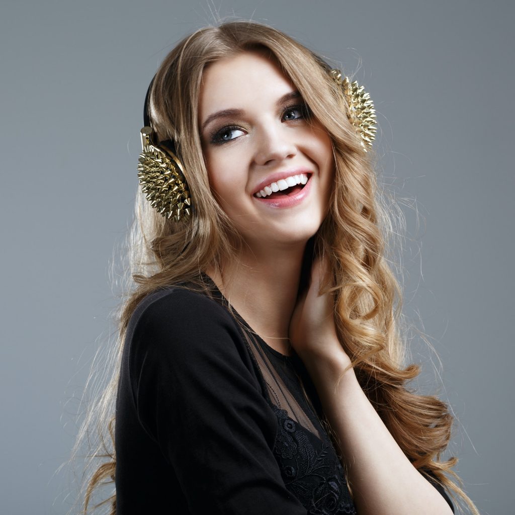 Happy Woman Listening to Music