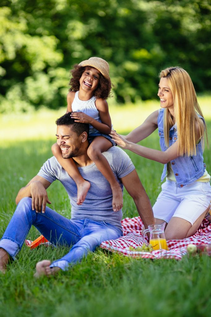 Family picnicking outdoors